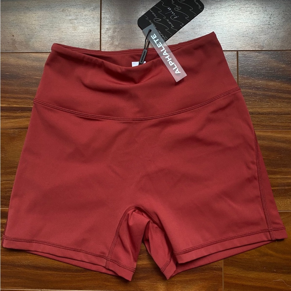 Alphalete pulse surge shorts tartan red